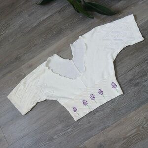 Cream knit low cut crop top with hand embroidered flowers